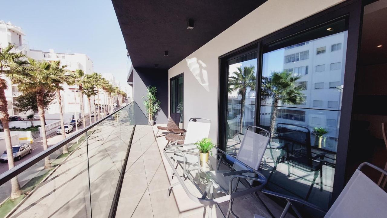 Apartamento Meerblick Quarteira Buitenkant foto