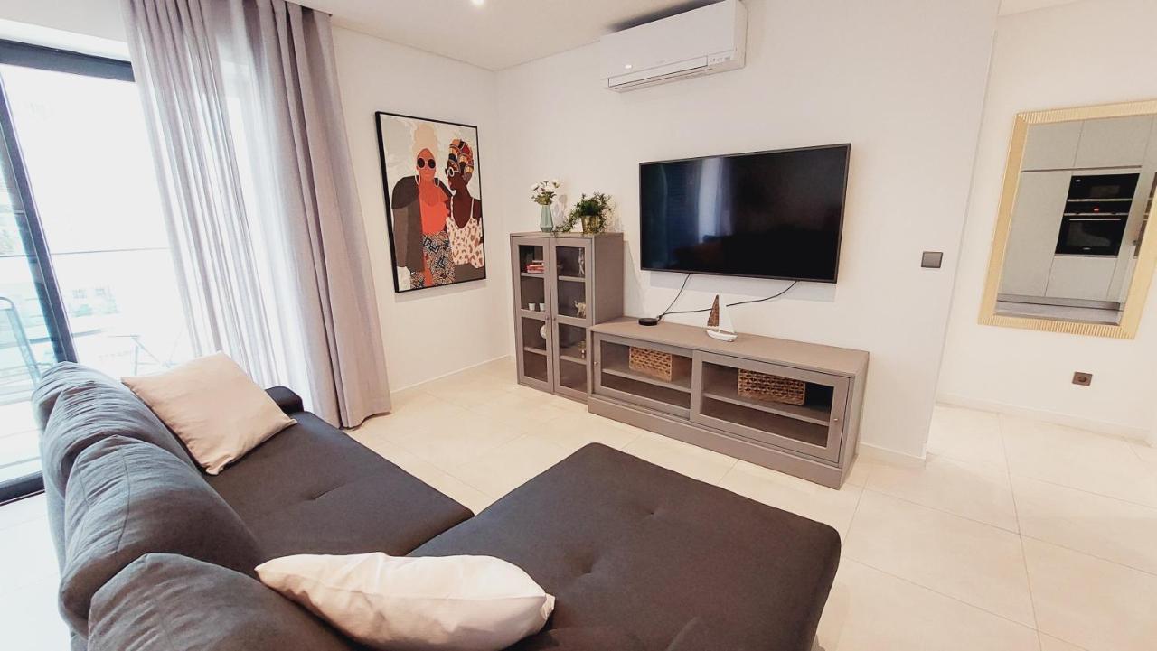 Apartamento Meerblick Quarteira Buitenkant foto